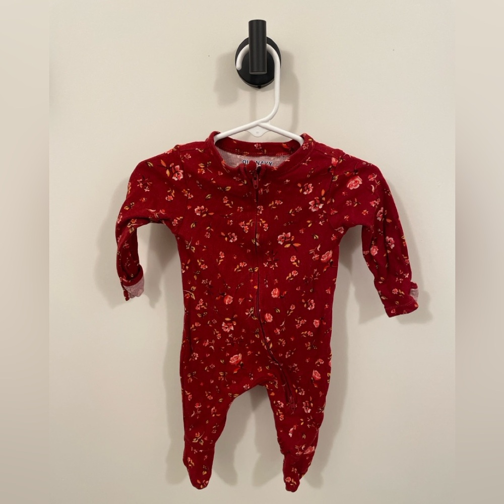 Old Navy size 0-3 footie onesie. Red with flowers. Fold over hand covers.
